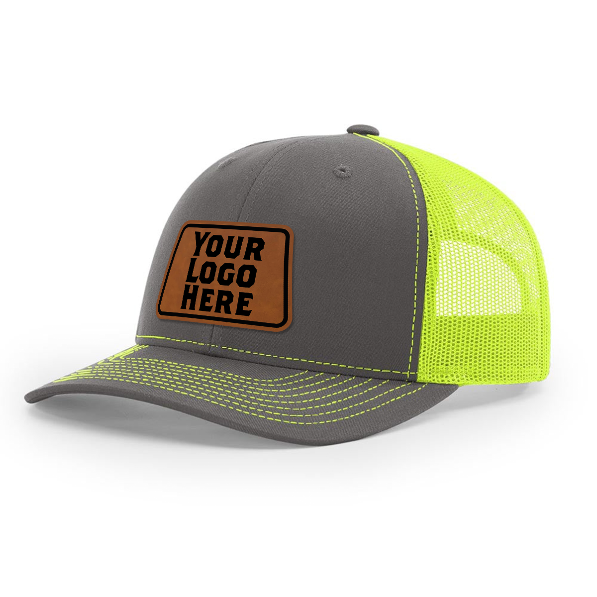 A snapback trucker cap with a custom leatherette patch that has space for a logo, featuring a gray crown and a neon yellow mesh back.